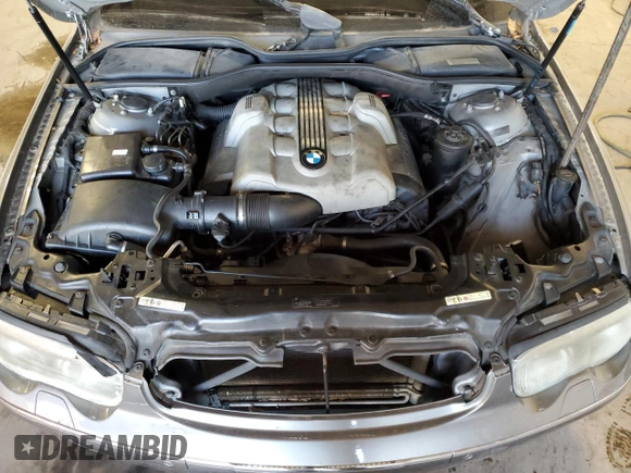 2004 BMW 7 Series 745Li z VIN WBAGN63584DS55291, wystawiony jako Copart lot #79178494 z przebiegiem 135 923 mil mil oraz Szkoda całkowita • Salvage title. Historia ofert i sprzedaży dostępna na DreamBid. Obrazek 11.