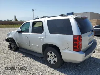 2014 Chevrolet Tahoe LT with VIN 1GNSCBE09ER118630, listed as a Copart auction lot 58906965 with 92,734 mi miles and Salvage title. Bid and sale history available at DreamBid. Image 2.