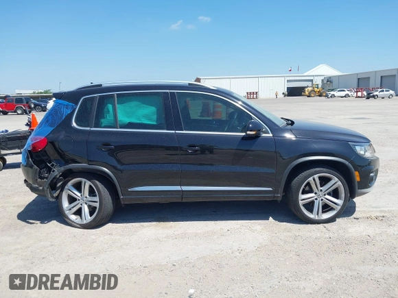 2014 Volkswagen Tiguan SEL with VIN WVGAV3AX4EW025339, listed as a IAAI auction lot 42313665 with 96,756 mi miles and . Bid and sale history available at DreamBid. Image 13.