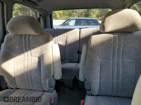 1999 Toyota Sienna LE with VIN 4T3ZF13C8XU108650, listed as a Copart auction lot 74476004 with 215,060 mi miles and Salvage Title. Bid and sale history available at carsss.com. Image 10.