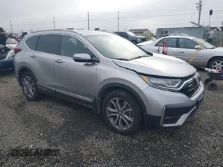 2021 Honda CR-V Touring with VIN 2HKRW2H9XMH212692, listed as a IAAI auction lot 41016640 with 24,149 mi miles. Bid and sale history available at carsss.com. Image 1.