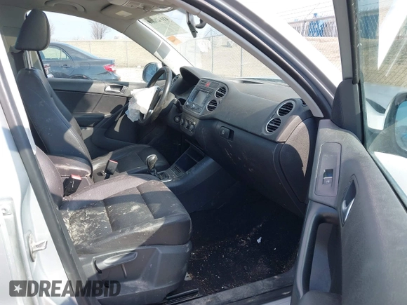 2011 Volkswagen Tiguan SE with VIN WVGBV7AX2BW562055, listed as a IAAI auction lot 41642084 with 175,407 mi miles and . Bid and sale history available at DreamBid. Image 5.