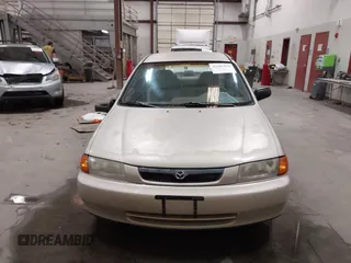 1998 Mazda Protege DX z VIN JM1BC1419W0171802, wystawiony jako IAAI lot #42202861 z przebiegiem 252 304 mil mil oraz . Historia ofert i sprzedaży dostępna na DreamBid. Obrazek 12.