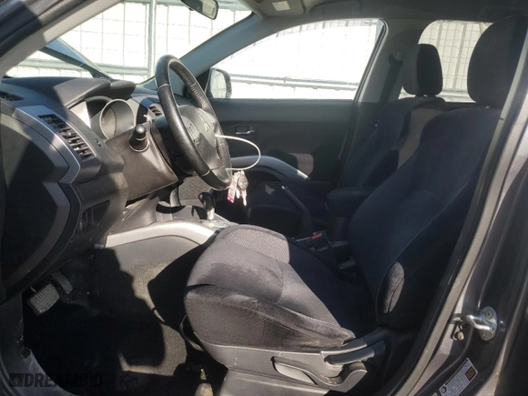 2012 Mitsubishi Outlander ES with VIN JA4AS2AW0CU025825, listed as a Copart auction lot 53082065 with 124,004 mi miles and Salvage Title. Bid and sale history available at carsss.com. Image 7.