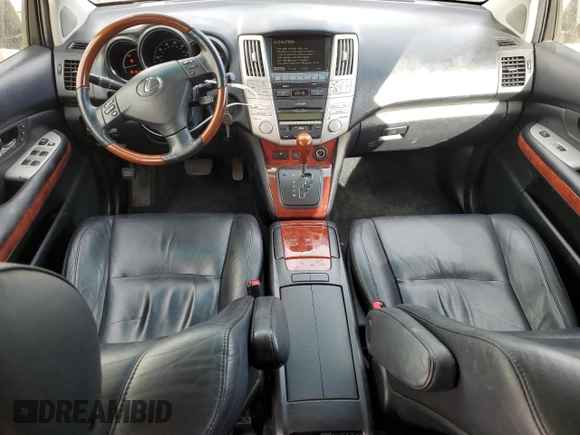 2007 Lexus RX 400h z VIN JTJGW31U972002681, wystawiony jako Copart lot #78883974 z przebiegiem 288 019 mil mil oraz Szkody całkowita. Historia ofert i sprzedaży dostępna na DreamBid. Obrazek 8.