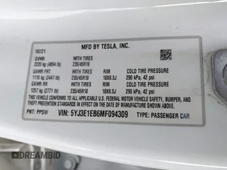 2021 Tesla Model 3 Long Range with VIN 5YJ3E1EB6MF094309, listed as a IAAI auction lot 41651475 with Not Provided miles. Bid and sale history available at carsss.com. Image 9.