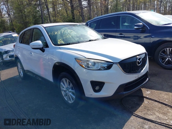2014 Mazda CX-5 Touring with VIN JM3KE2CY5E0329783, listed as a IAAI auction lot 42017473 with 121,175 mi miles. Bid and sale history available at carsss.com. Image 1.