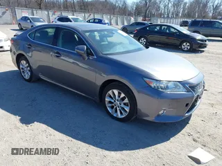 2014 Lexus ES 300h with VIN JTHBW1GG6E2071083, listed as a IAAI auction lot 41772226 with 140,710 mi miles and . Bid and sale history available at DreamBid. Image 1.