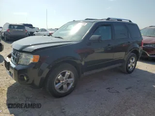 2010 Ford Escape Limited with VIN 1FMCU9E74AKC63136, listed as a Copart auction lot 62388655 with 1,569,143 mi miles and Salvage title. Bid and sale history available at DreamBid. Image 1.