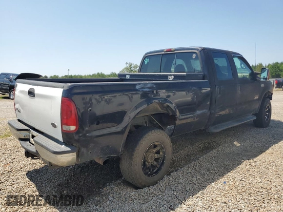 2000 Ford F-350 XL with VIN 1FTSW31F3YEB20854, listed as a Copart auction lot 61717865 with 209,288 mi miles and Salvage title. Bid and sale history available at DreamBid. Image 3.