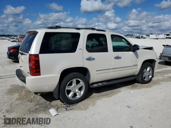 2012 Chevrolet Tahoe LTZ with VIN 1GNSCCE08CR214560, listed as a Copart auction lot 44723175 with 137,489 mi miles and Salvage title. Bid and sale history available at DreamBid. Image 3.