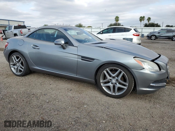 2014 Mercedes-Benz SLK 250 with VIN WDDPK4HA0EF091357, listed as a Copart auction lot 82316804 with 71,993 mi miles and Salvage title. Bid and sale history available at DreamBid. Image 4.