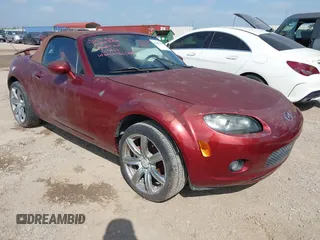2008 Mazda MX-5 Miata Special Edition z VIN JM1NC25F280138639, wystawiony jako IAAI lot #42411655 z przebiegiem 91 259 mil mil oraz . Historia ofert i sprzedaży dostępna na DreamBid. Obrazek 1.