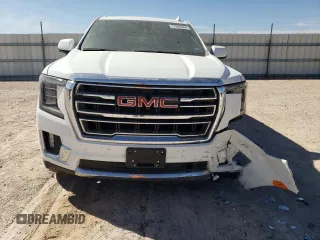2024 GMC Yukon SLT with VIN 1GKS2BKD6RR237359, listed as a Copart auction lot 77892564 with 9,880 mi miles and Salvage Title. Bid and sale history available at carsss.com. Image 5.