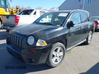 2007 Jeep Compass Sport with VIN 1J8FT470X7D420472, listed as a IAAI auction lot 41358402 with 178,668 mi miles. Bid and sale history available at carsss.com. Image 2.