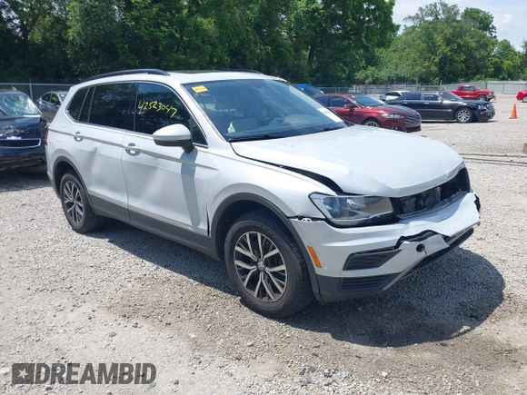 2018 Volkswagen Tiguan SEL z VIN 3VV2B7AX6JM195125, wystawiony jako IAAI lot #42523047 z przebiegiem 73 926 mil mil oraz . Historia ofert i sprzedaży dostępna na DreamBid. Obrazek 1.