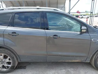 2015 Ford Escape Titanium z VIN 1FMCU0JX3FUA71770, wystawiony jako IAAI lot #42085635 z przebiegiem 141 890 mil mil oraz . Historia ofert i sprzedaży dostępna na DreamBid. Obrazek 13.