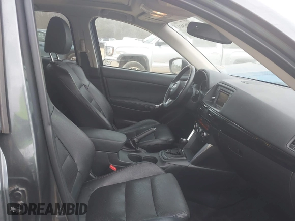 2013 Mazda CX-5 Grand Touring with VIN JM3KE4DE2D0164225, listed as a IAAI auction lot 41663412 with 162,738 mi miles. Bid and sale history available at carsss.com. Image 5.