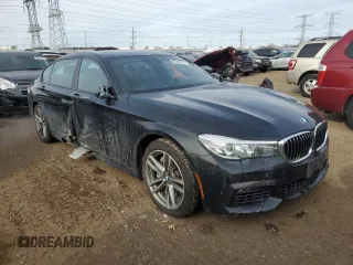 2019 BMW 7 Series 740i xDrive z VIN WBA7E4C50KGV28241, wystawiony jako Copart lot #87329774 z przebiegiem Nie podano mil oraz Szkoda całkowita • Salvage title. Historia ofert i sprzedaży dostępna na DreamBid. Obrazek 4.
