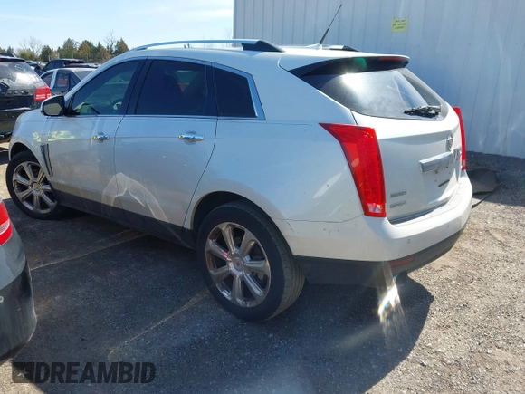 2014 Cadillac SRX Performance Collection with VIN 3GYFNCE36ES527809, listed as a IAAI auction lot 41790776 with 166,302 mi miles. Bid and sale history available at carsss.com. Image 3.