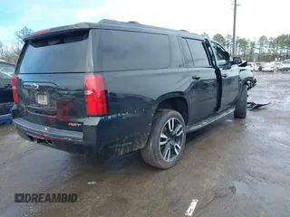 2020 Chevrolet Suburban LT with VIN 1GNSKHKC3LR170868, listed as a IAAI auction lot 41575519 with 131,080 mi miles. Bid and sale history available at carsss.com. Image 4.