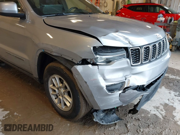 2019 Jeep Grand Cherokee Laredo E with VIN 1C4RJFAG8KC823814, listed as a IAAI auction lot 41728782 with 120,695 mi miles. Bid and sale history available at carsss.com. Image 6.