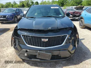 2021 Cadillac XT4 FWD Sport with VIN 1GYFZER44MF015908, listed as a Copart auction lot 52214925 with 94,079 mi miles and Clean Title. Bid and sale history available at carsss.com. Image 5.