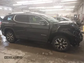 2021 GMC Acadia SLE with VIN 1GKKNRLS9MZ232758, listed as a IAAI auction lot 41548170 with 56,714 mi miles. Bid and sale history available at carsss.com. Image 14.