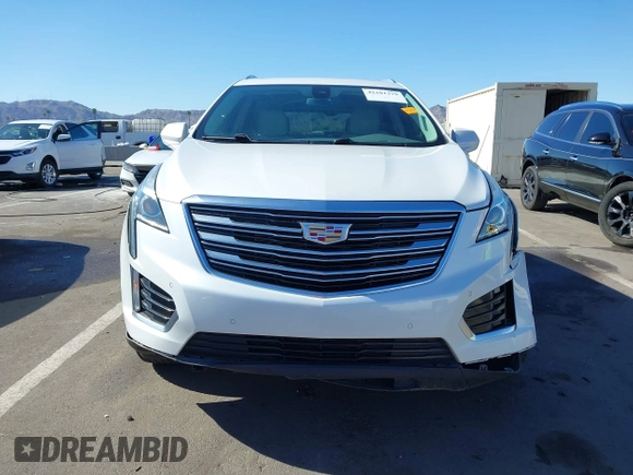 2017 Cadillac XT5 Luxury AWD z VIN 1GYKNDRS8HZ120863, wystawiony jako IAAI lot #42101279 z przebiegiem 100 535 mil mil oraz . Historia ofert i sprzedaży dostępna na DreamBid. Obrazek 13.