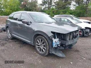 2018 Mazda CX-9 Grand Touring z VIN JM3TCBDY9J0215952, wystawiony jako IAAI lot #42133957 z przebiegiem 127 967 mil mil oraz . Historia ofert i sprzedaży dostępna na DreamBid. Obrazek 1.