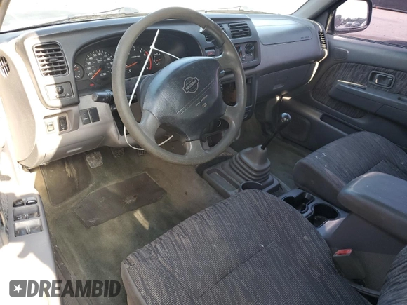 2000 Nissan Frontier XE with VIN 1N6ED27T7YC300373, listed as a Copart auction lot 55829535 with 301,305 mi miles and Salvage title. Bid and sale history available at DreamBid. Image 8.