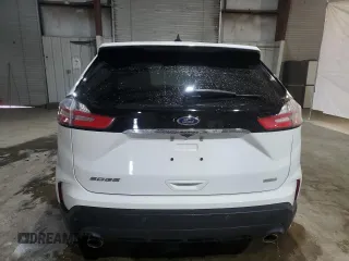 2020 Ford Edge SE z VIN 2FMPK3G95LBA59607, wystawiony jako Copart lot #59460115 z przebiegiem 139 134 mil mil oraz Czysty tytuł • Clean title. Historia ofert i sprzedaży dostępna na DreamBid. Obrazek 6.