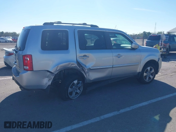 2015 Honda Pilot EX-L with VIN 5FNYF3H69FB001265, listed as a IAAI auction lot 41017830 with 188,572 mi miles and . Bid and sale history available at carsss.com. Image 6.
