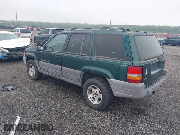 1996 Jeep Grand Cherokee Laredo with VIN 1J4GZ58S6TC333856, listed as a IAAI auction lot 42504895 with 176,955 mi miles and . Bid and sale history available at DreamBid. Image 3.