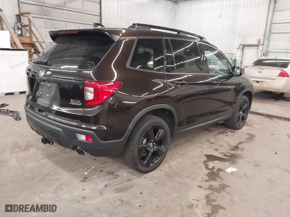 2020 Honda Passport Elite with VIN 5FNYF8H02LB010085, listed as a IAAI auction lot 41815080 with 79,343 mi miles. Bid and sale history available at carsss.com. Image 4.