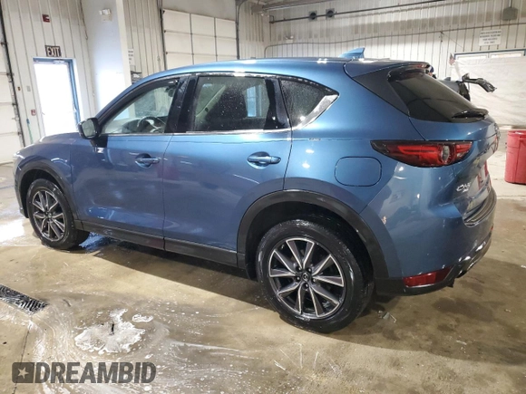 2018 Mazda CX-5 Grand Touring with VIN JM3KFBDM9J0411504, listed as a Copart auction lot 42050825 with 125,695 mi miles and Salvage Title. Bid and sale history available at carsss.com. Image 2.