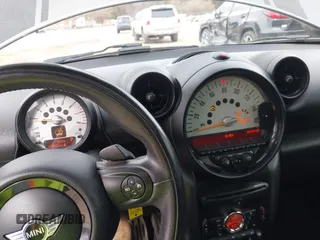 2014 MINI Countryman S with VIN WMWZC3C55EWT00349, listed as a IAAI auction lot 41738181 with 133,662 mi miles and . Bid and sale history available at DreamBid. Image 7.