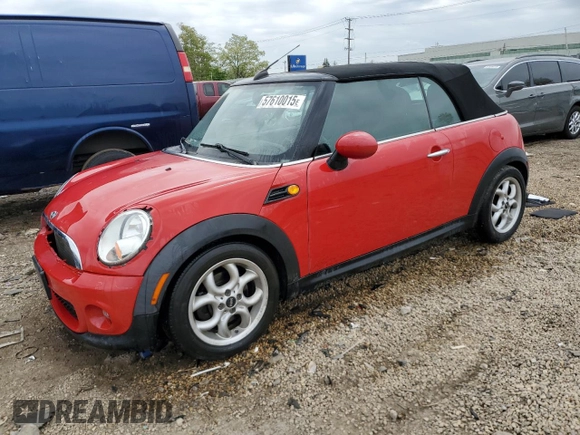 2012 MINI Convertible with VIN WMWZN3C58CT134224, listed as a Copart auction lot 57610015 with 141,394 mi miles and Salvage title. Bid and sale history available at DreamBid. Image 1.