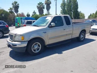 2000 Ford F-150 XL with VIN 1FTRX17L7YKA00540, listed as a IAAI auction lot 42739489 with Not provided miles and . Bid and sale history available at DreamBid. Image 2.