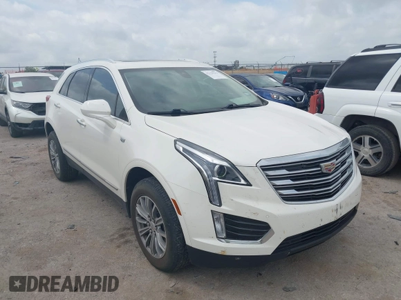 2019 Cadillac XT5 Luxury FWD z VIN 1GYKNCRSXKZ286643, wystawiony jako IAAI lot #42129213 z przebiegiem 87 091 mil mil oraz . Historia ofert i sprzedaży dostępna na DreamBid. Obrazek 1.