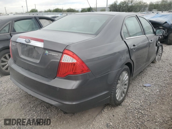 2011 Ford Fusion Hybrid с VIN 3FADP0L39BR214920, выставлен на аукционе Copart как лот 57888465 с пробегом 133 656 миль миль и Списание • Salvage title. История ставок и продаж доступна на DreamBid. Изображение 3.