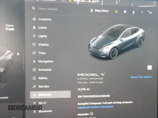 2024 Tesla Model Y Long Range z VIN 7SAYGDEE4RA229466, wystawiony jako Copart lot #45163325 z przebiegiem 13 748 mil mil oraz Szkoda całkowita • Salvage title. Historia ofert i sprzedaży dostępna na DreamBid. Obrazek 9.