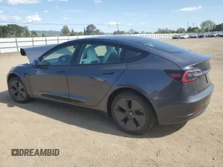 2022 Tesla Model 3 with VIN 5YJ3E1EA4NF244376, listed as a Copart auction lot 52142855 with Not Provided miles and Salvage Title. Bid and sale history available at DreamBid. Image 2.