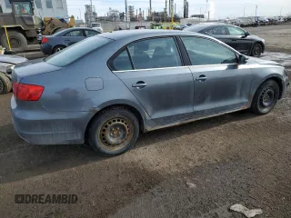 2013 Volkswagen Jetta with VIN 3VWWL7AJ6DM427118, listed as a Copart auction lot 50937335 with 337,598 mi miles and Salvage title. Bid and sale history available at DreamBid. Image 3.