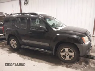 2005 Nissan Xterra S with VIN 5N1AN08U95C633157, listed as a IAAI auction lot 41277946 with 213,067 mi miles. Bid and sale history available at carsss.com. Image 13.