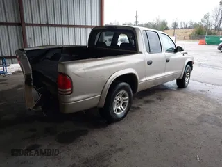 2003 Dodge Dakota SLT with VIN 1D7HL48N93S303911, listed as a IAAI auction lot 41536555 with 383,306 mi miles. Bid and sale history available at carsss.com. Image 4.