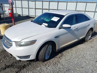 2013 Ford Taurus SEL with VIN 1FAHP2E87DG221557, listed as a IAAI auction lot 41331531 with 152,879 mi miles. Bid and sale history available at carsss.com. Image 2.