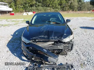 2018 Ford Fusion SE with VIN 3FA6P0LU7JR138906, listed as a IAAI auction lot 41573985 with 127,660 mi miles and . Bid and sale history available at DreamBid. Image 12.