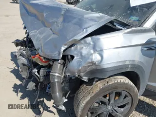 2022 Volkswagen Taos z VIN 3VVGX7B29NM001350, wystawiony jako IAAI lot #41684049 z przebiegiem 32 531 mil mil oraz . Historia ofert i sprzedaży dostępna na DreamBid. Obrazek 6.