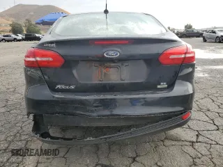 2018 Ford Focus SE with VIN 1FADP3FE8JL300246, listed as a Copart auction lot 59585035 with 83,141 mi miles and Salvage title. Bid and sale history available at DreamBid. Image 6.